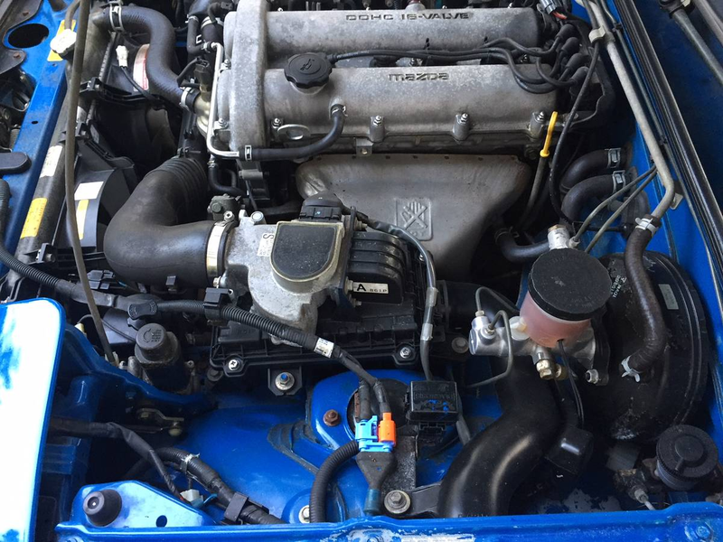 Illustration for article titled Could This Ultra-Low Mileage 1990 Mazda Miata be Worth $6,999?